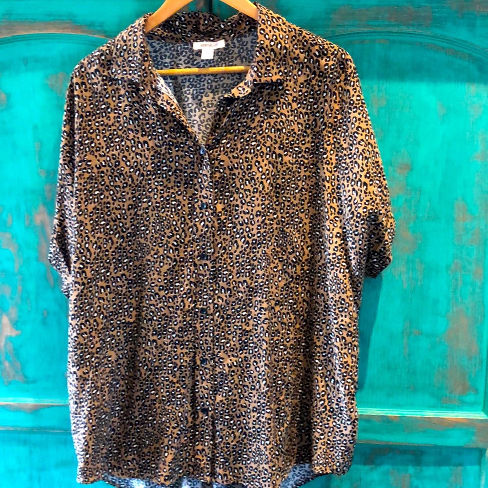 Relaxed and oversized leopard button down shirt